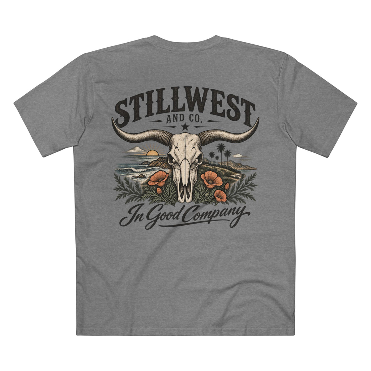 A heather gray short-sleeve t-shirt shown from the back, featuring a large graphic print of a steer skull with long horns, desert scenery, orange poppies, and the text 'STILLWEST AND CO.' and 'In Good Company'.