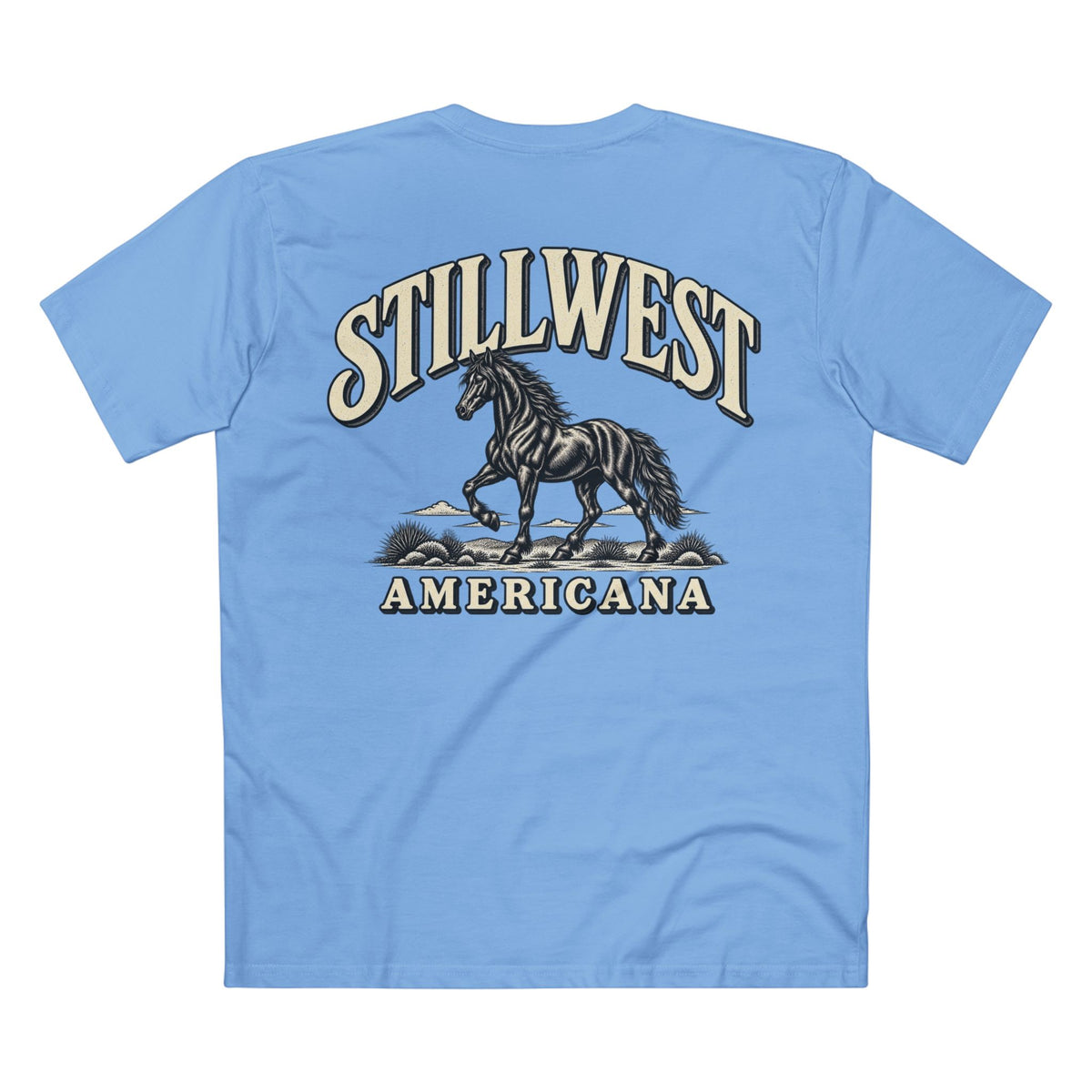 A light blue short-sleeve t-shirt shown from the back, featuring a large graphic print of a black horse with the text 'STILLWEST AMERICANA' in cream and dark blue.