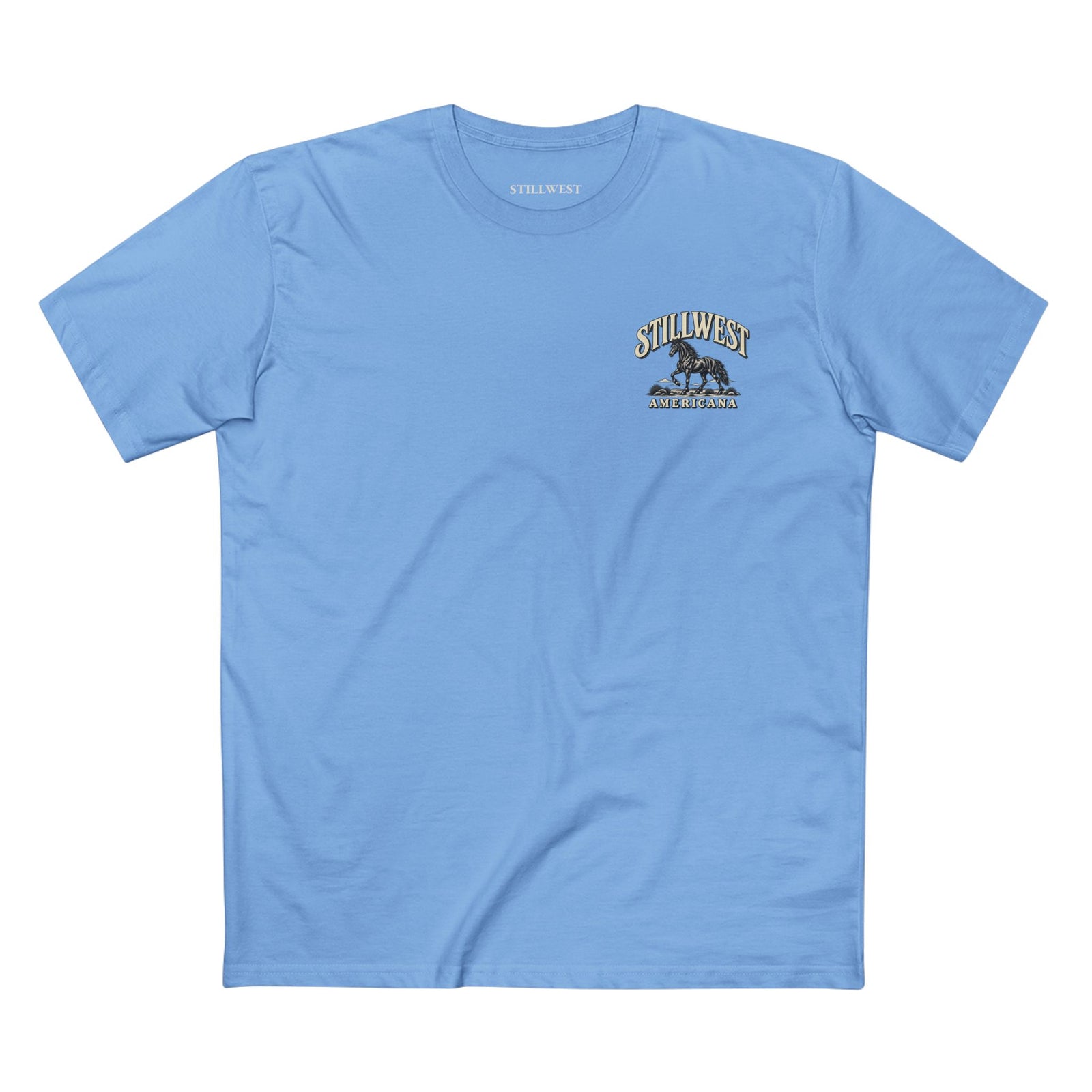 A light blue crewneck t-shirt with a small graphic on the left chest featuring a Mustang horse and the text 'STILLWEST' and 'AMERICANA.