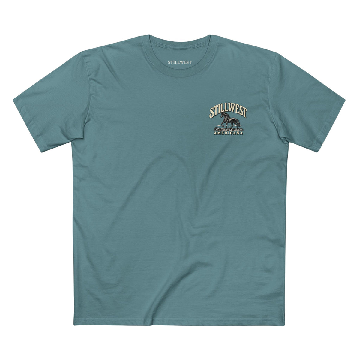 A teal blue short-sleeve t-shirt with a small graphic on the left chest featuring the words 'STILLWEST' and 'AMERICANA' with an illustration of a Mustang horse.