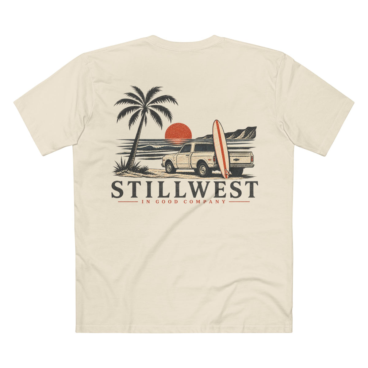 A cream-colored short-sleeve t-shirt shown from the back, featuring a vintage-style graphic of a beach scene with a palm tree, a pickup truck carrying a surfboard, a red sun, and the text 'STILLWEST IN GOOD COMPANY'.
