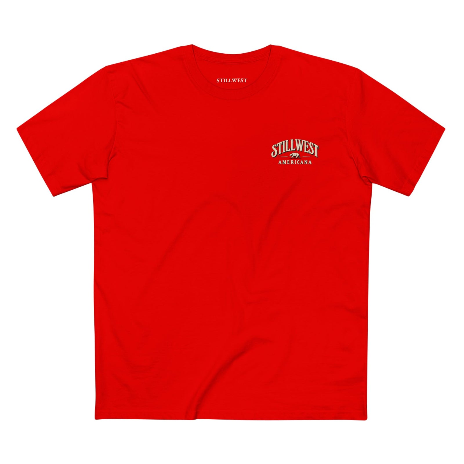A red t shirt with the words stillwest americana and a bear illustration on the front.
