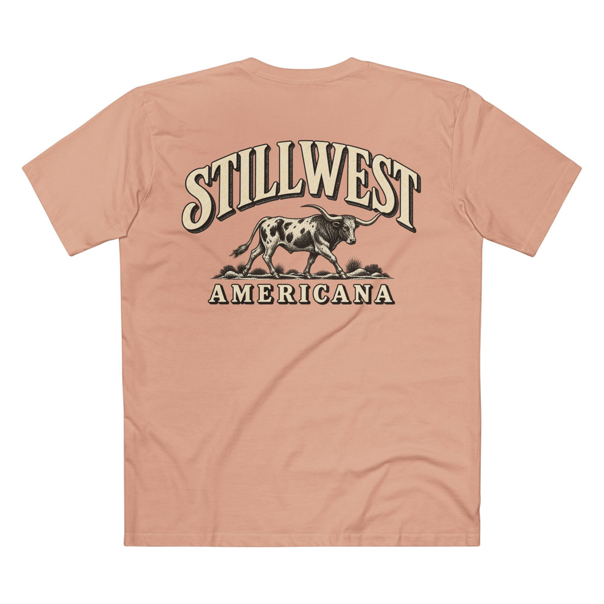 A peach-colored short-sleeve t-shirt shown from the back, featuring a large graphic print of a longhorn steer and the words 'STILLWEST AMERICANA' in a western-style font.