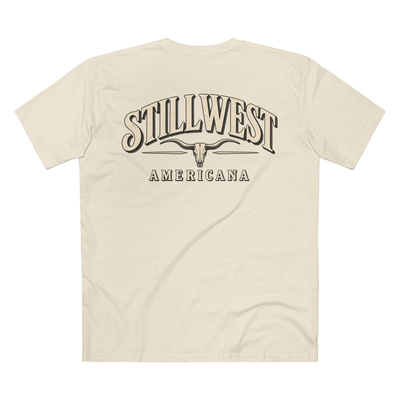 A cream-colored short-sleeve t-shirt shown from the back, featuring a large graphic print with the words 'STILLWEST AMERICANA' and a longhorn skull design.