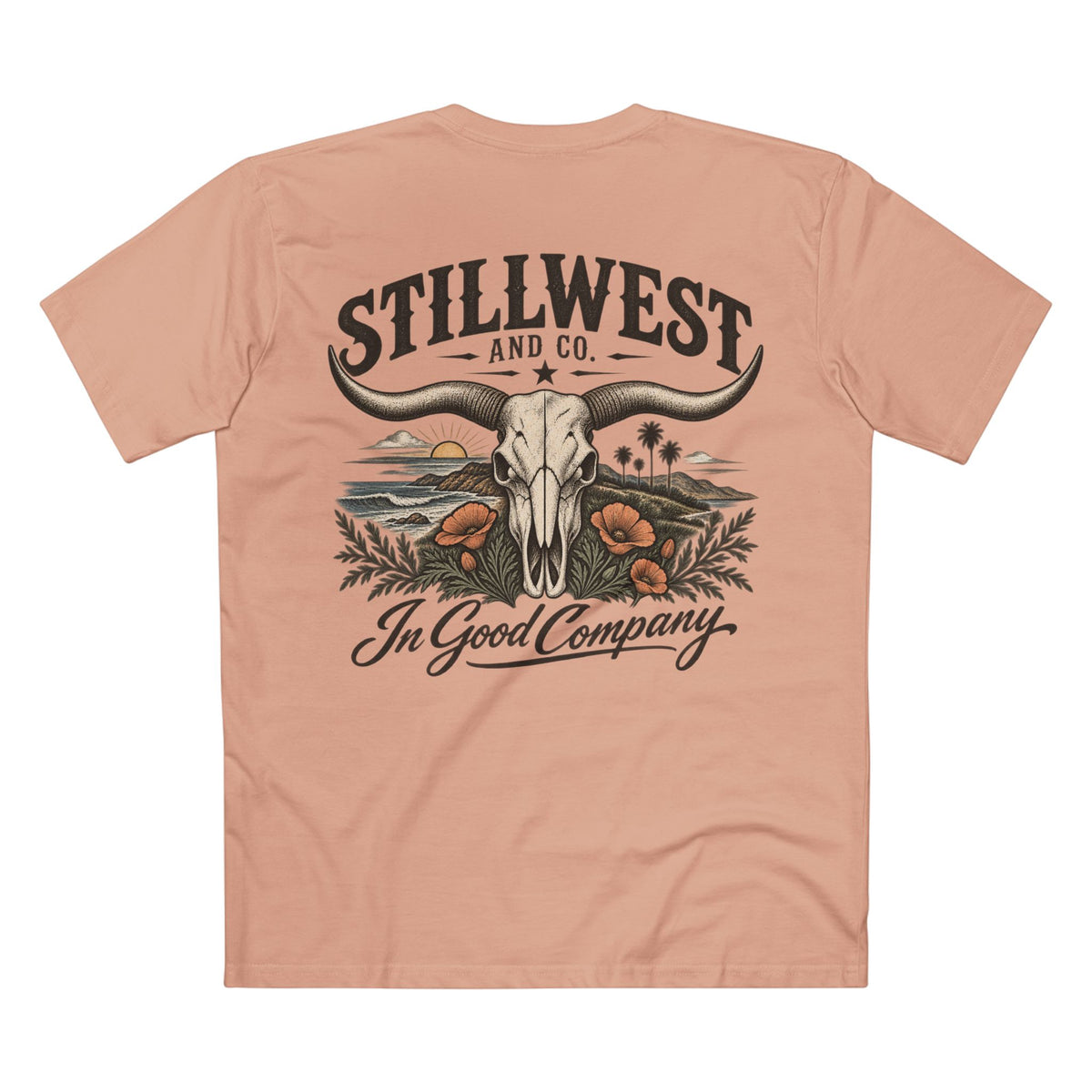 A peach-colored short-sleeve t-shirt shown from the back, featuring a large graphic print of a steer skull, a longhorn, desert scenery, and the text 'STILLWEST AND CO. In Good Company'.