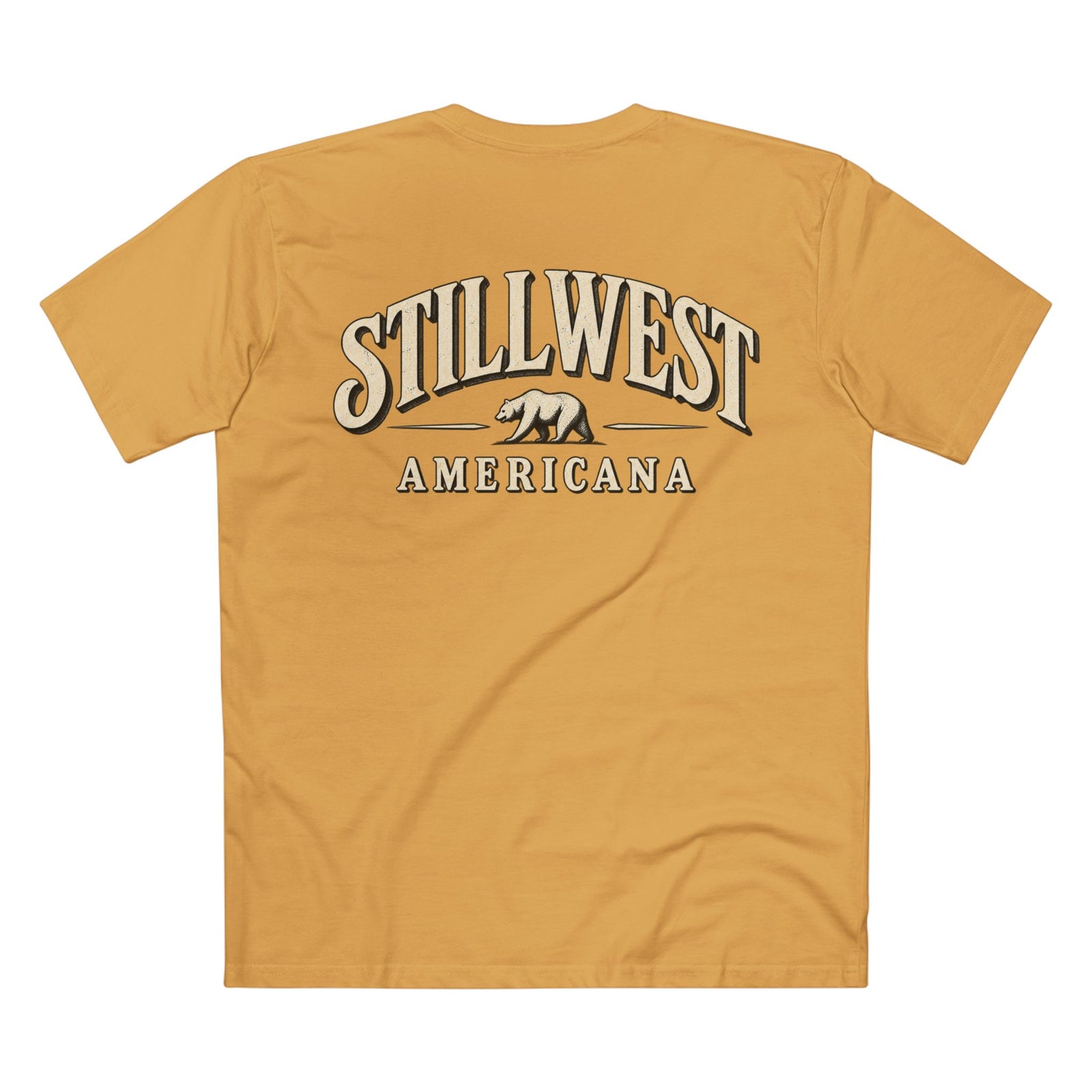 A mustard yellow t-shirt shown from the back, featuring a large graphic print that reads 'STILLWEST AMERICANA' with a grizzly bear logo in the center.