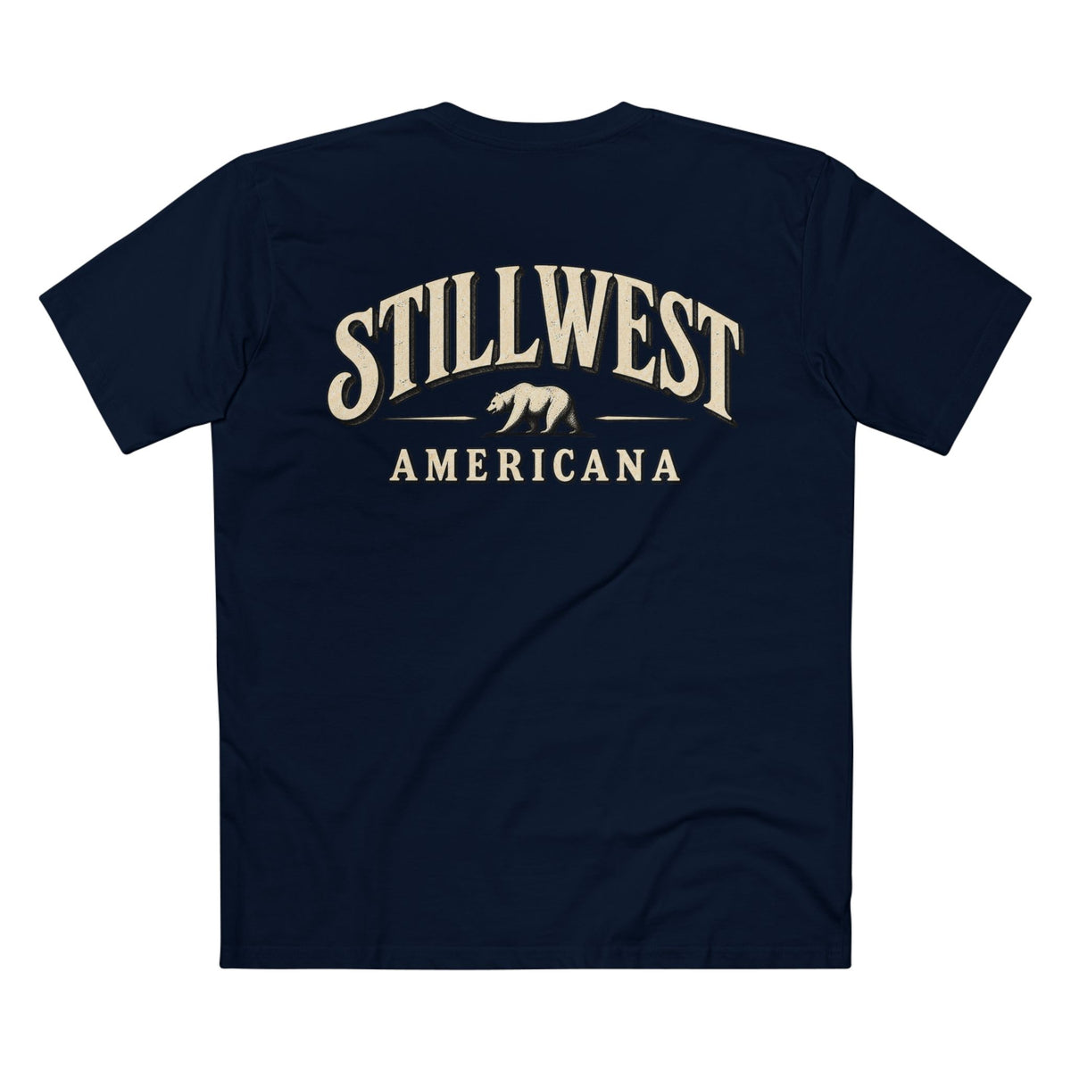 A navy blue short-sleeve t-shirt shown from the back, featuring a distressed cream-colored graphic print that reads 'STILLWEST AMERICANA' with a bear silhouette in the center, on a plain white background.