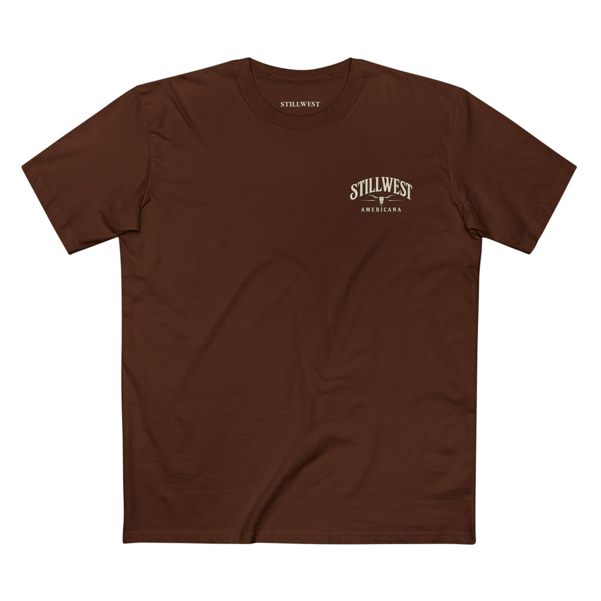 A brown t shirt with the words stillwest americana and a longhorn skull on the front.