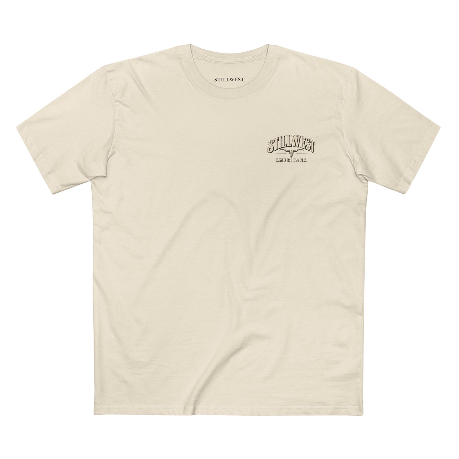 A cream colored shirt with the words stillwest americana and a longhorn skull on the front.