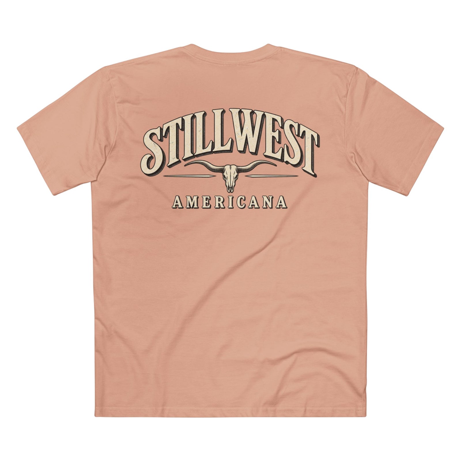 A peach-colored short-sleeve t-shirt shown from the back, featuring a large graphic print with the words 'STILLWEST AMERICANA' and a longhorn skull design in beige and dark brown.